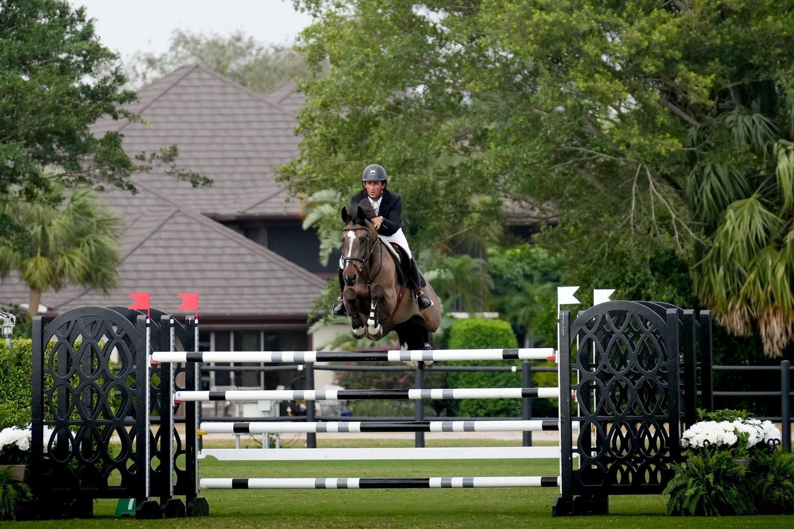 Nicholas Dello Joio jumping in competition